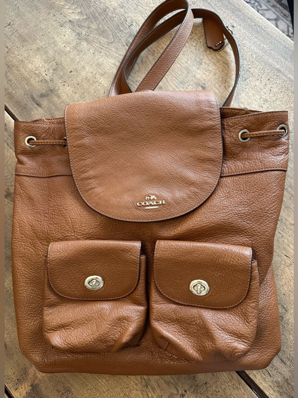 GUC Authentic Coach Backpack Bag in saddle leather with gold hardware.